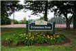 Cummings Park Sign surrounded by plants