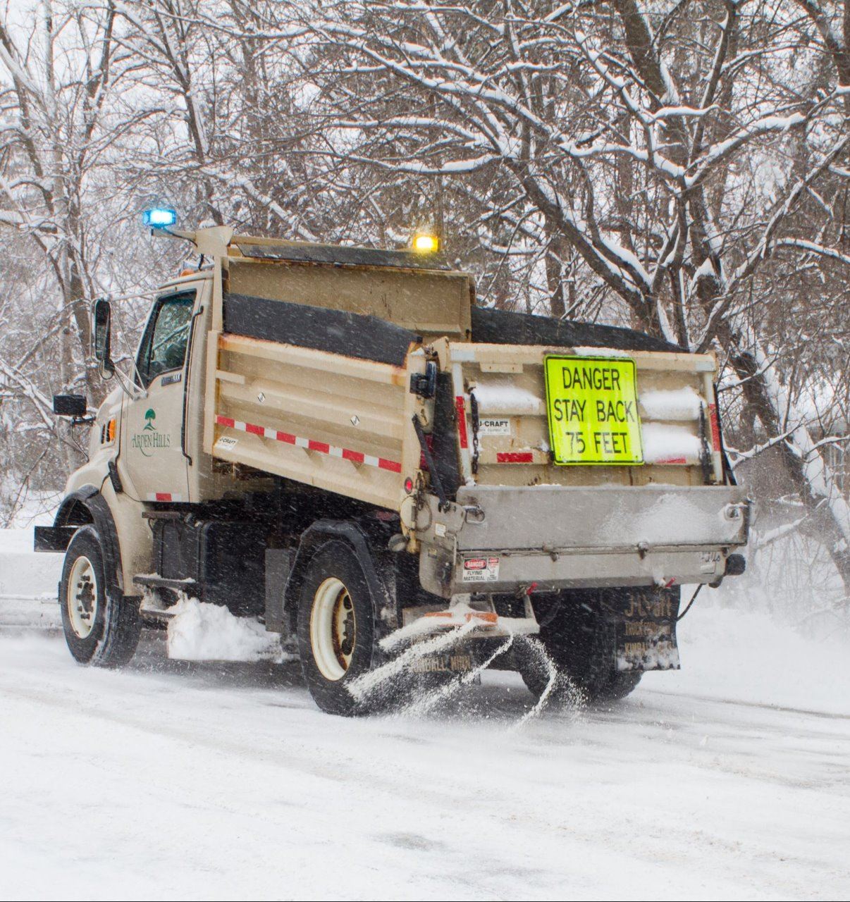 city snowplow on street
