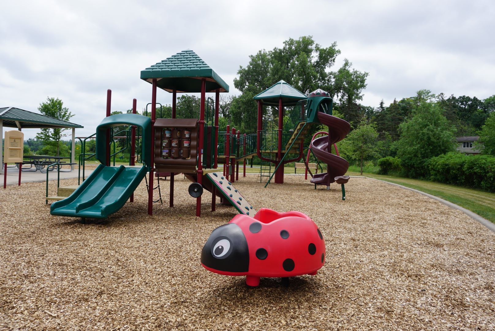 Valentine Hills Park Playground with Ladybug shaped toy
