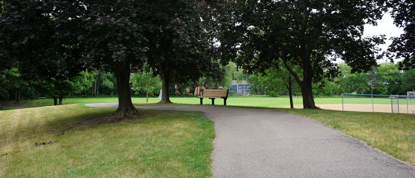 Hazelnut Park Paved Trail with Bench